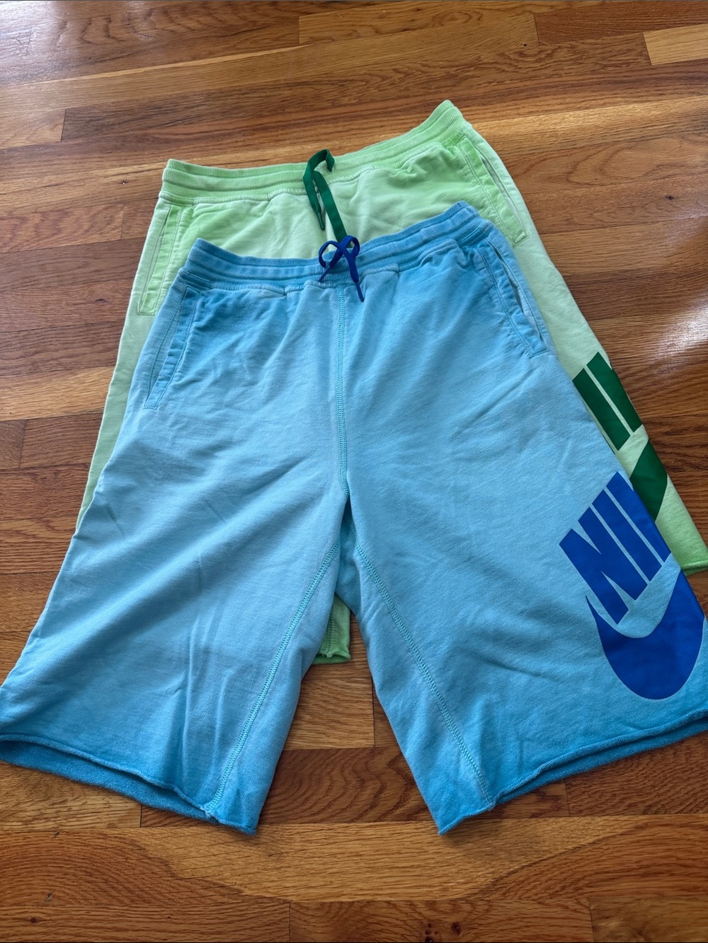 2 pairs Nike Light Blue Shorts with Dark Blue Logo